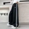 Pantalones de chándal casuales a rayas de retazos, versátiles, holgados, de moda, para niñas, estilo nuevo de primavera y otoño, pantalones largos de moda para exteriores