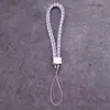 Lanyard para teléfono móvil al por mayor de fábrica, cordón para llavero de cámara de cuero PU, cuerda de muñeca para teléfono móvil de pareja, cuerda tejida de cuero