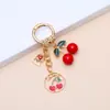 Llavero de cereza fresca más vendido transfronterizo de Ins, colgante de bolsa de flor de rosa de moda europea y americana, accesorio de cadena para teléfono móvil
