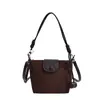 Bolsa de mano de nicho estilo coreano para commuting para mujer, nueva, casual, retro, bolsa de axila, para salir, bandolera, cruzada, moderna