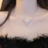 Collar de Zirconia con Lazo y Perlas Transfronterizo Europeo y Americano, Cadena para Suéter de Estilo de Lujo Ligero de Nicho, Accesorio Exquisito y de Moda