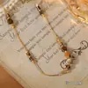 Popular Cadena Doble para Clavícula de Caballo con Piedra Natural Ojo de Tigre y Cuentas de Color Contrastante de Ainibeni, Collar de Moda y Versátil
