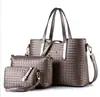 Bolsa feminina 2020 Quatro Estações Nova bolsa trançada mãe e filho conjunto de três peças feminina portátil de ombro mensageiro moda europeia e americana
