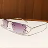 Novos Óculos de Sol Vazados de Metal Sem Aro Estilo Hot Girl Y2K, Moda Europeia e Americana Estilo de Rua Proteção Solar Óculos de Sol Transfronteiriços Femininos