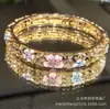 En Stock Suministro Directo de Fábrica Pulsera de Cloisonné con Filigrana Hueca, Flores Esmaltadas e Incrustaciones de Diamantes, Regalo de Área Escénica Nacional al por Mayor