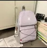 Mochila ligera con cordón y bloques de color estilo montaña para estudiantes universitarios y parejas, adecuada para viajes al aire libre, senderismo, camping, disponible en varios tamaños