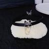 Moda dulce genial ojos de cuero perro borla collar clip para oreja femenino estilo frío personalidad diseño de nicho cadena para clavícula accesorios