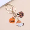 Colgantes de llavero de Halloween transfronterizos europeos y americanos calabaza fantasma gato calavera metal esmalte accesorios para bolso al por mayor