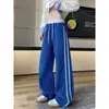 Pantalones casuales de retazos con estampado de escamas de dragón estilo americano para hombre, pantalones deportivos de otoño de alta resistencia de pierna recta, pantalones holgados de pierna ancha con retazos a rayas