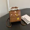Linda mochila de oso de dibujos animados para mujer, nuevo estilo 2026, diseño simple, adecuada para estudiantes y personas que van al trabajo, mini mochila con un lazo