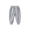 Calça Jogger Versátil Estilo Esportivo para Crianças, Primavera e Outono, Nova Cor Sólida Simples Estilo Coreano Calças Longas, Atacado de Peça Única