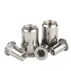 Tuerca remachable de cabeza plana con patrón vertical, tuerca de tracción, semihexagonal, tuerca de tracción hembra, color zinc, zinc blanco, acero al carbono, acero inoxidable 304, tapa de tracción