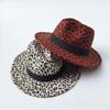 Sombrero al por mayor Sombrero de leopardo de lana europeo y americano moda marea sombrero de jazz de ala plana punto una generación de sombrero de adulto