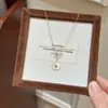 Moderna Cadena de Clavícula con Colgante de Estrella de Ocho Puntas Lujo Ligero Nicho Sentido de Alta Gama Temperamento Cadena de Clavícula Collar para Mujeres 2026 Nuevo Estilo Caliente