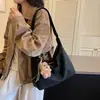 Bolsa feminina de grande capacidade 2026 novo estilo nicho versátil para o dia a dia bolsa tote super moderna casual de ombro transversal