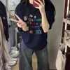 Verão 2026 Nova Camiseta Top de Algodão Puro Estilo Coreano Tamanho Grande com Estampa Divertida de Desenho Animado, Unissex de Manga Curta e Versátil