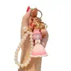 Llavero de resina de dibujos animados Princesa Perla femenino lindo corazón de niña estilo ins cadena para teléfono móvil pulsera llavero bolsa