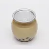 Latas, botellas de bebidas, botellas de té de leche de moda, latas esféricas de plástico de grado alimenticio para café desechables, botellas de jugo