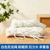 Venta al por mayor del fabricante, cuerda tejida blanca, cuerda de amarre de nailon para exteriores a prueba de viento, cuerda a prueba de viento para tienda de campaña, cuerda de nailon para tendedero