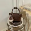 Bolsas de dama de alta gama cuidadosamente seleccionadas 2026 nuevo popular de otoño exquisita hermosa para salir bolso de mano para ir al trabajo de un solo hombro cruzado