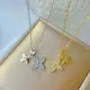 Moda Micro-Incrustación Doble Flor de Cuatro Hojas Acero de Titanio Collar Versátil Temperamento Color Oro Real Conservación del Color Galvanizado Cadena de Clavícula para Mujer Joyería