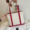 Bolsa Casual de Lona 2025 Nova Bolsa Tote para Deslocamento Casual Versátil Bolsa de Mão Bolsa de Ombro de Alto Nível Bolsa Feminina