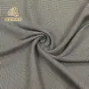 Abrigo de Tela de Espiga Estructurada de Moda 90% Poliéster Hilado Fino Fábrica de Tejido de Lana Suministro Directo Tela en Stock