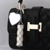 Nuevo Comercio Exterior Creativo Cuero Portátil Forma de Corazón Espejo Bolsa para Labiales Colgante Llavero Moda Bolso Accesorio