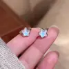 Aretes Flor de Cuatro Hojas Azul Hielo, Aretes de Alta Gama, Estrella de Cinco Puntas, Aretes Frescos y Versátiles para Mujer, Lujo Ligero