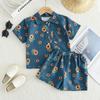 Traje Infantil Estilo Verano 2025 Estilo Coreano Holgado Traje de Imitación Denim para Niños y Niñas, Conjunto de Dos Piezas con Shorts de Manga Corta Estampados para Niños