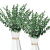Folhas de eucalipto artificiais transfronteiriças, galhos verde-dourados, folhas de eucalipto, decoração de casamento, interior de casa, flores artificiais