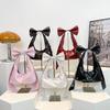 Estilo americano Hot Girl Sweet Cool Style Bow Design Bolsa de ombro com axila Outono e inverno Nova bolsa de mão estilo máquina de rebite