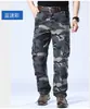 Pantalones casuales gruesos para exteriores de primavera y otoño para hombre, de montañismo, multibolsillos, de talla grande, rectos, sueltos, tácticos, de algodón puro.