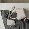 Bolsa de Ombro Único com Textura Trançada 2026 Novo Estilo Relaxado Cor Sólida Bolsa Saco Alta Aparência Simples Estilo Coreano Bolsa Transversal para o Dia a Dia