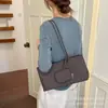 Elegante Bolso Tote Casual de Moda para Mujer 2026 Principios de Otoño Nuevo Estilo Coreano Bolso de Hombro Único para el Trabajo Ligero de Mano Bolso Grande
