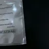 Bolsa de plástico transparente anti-asfixia de Amazon bolsa con cremallera para ropa de PE sellada por tres lados con etiqueta de advertencia bolsa de vacío transfronteriza