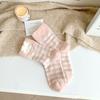 Calcetines gruesos de otoño e invierno para niños, bonitos calcetines de felpa rosa de tubo medio para mujer, cálidos calcetines de terciopelo de visón para dormir en casa.