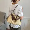 Bolso de hombro tipo tote de cuero de diseño único estilo vintage para mujer, nuevo modelo verano 2026, adecuado para el uso diario, bolso de hombro y cruzado