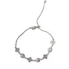 Pulseira Redonda Flor de Trevo de Zircônia Minimalista Fresca e Estilosa, Joia de Mão Versátil de Luxo Leve Exquisita Super Brilhante