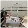 Bolsa de Ombro Seersucker Doce e Fresca 2025 Estilo de Hong Kong Casual Bolsa de Ombro com Laço Bolsa Transversal Simples e Fashion