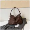 Bolso de hombro y bandolera de nicho moderno estilo coreano, nuevo modelo otoño e invierno 2025, bolso tote vintage de gran capacidad para mujer