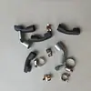 Máquina perforadora de tierra Máquina excavadora Podadora de setos Desgarrador Cortacésped Accesorios para cortacésped Tubo de escape Codo de silenciador