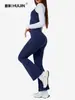 Bestseller transfronterizo: Conjunto deportivo de tres piezas en bloques de color con capas, que incluye bralette, top de manga larga, cintura con doblez y pantalones acampanados para fitness casual