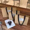 Bolsas de Mano No Tejidas para Tienda de Ropa Correas Engrosadas Ropa de Mujer Regalo Bolsas de Empaque para Compras Bolsas de Regalo Venta al por Mayor
