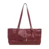 Bolso de cubo de mano de estilo coreano de moda transfronterizo para mujer 2026 Otoño nuevo bolso de hombro único de empalme de color sólido bolso de axila para commuting
