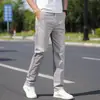 Calças casuais versáteis masculinas folgadas retas elásticas calças de terno outono novo negócios slim fit trabalho calças de outono masculinas