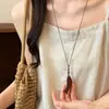 Nuevo collar colgante de pez de palisandro estilo chino, estilo étnico vintage, cadena larga versátil para suéter, accesorio de diseñador para mujer