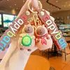 Lindo creativo bebida té con leche sostener tortuga capibara muñeco llavero colgante de bolsa llavero para llaves de coche pequeño regalo