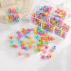 Al por mayor versión coreana de color caramelo dibujos animados clip flor pequeña estrella de cinco puntas pasador de princesa pinza de garra pasador femenino joya en caja