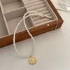 Colar de pérolas moeda de ouro estilo Baihe branco Olho de Diabo feminino nicho alta qualidade temperamento corrente de suéter de pérola de arroz